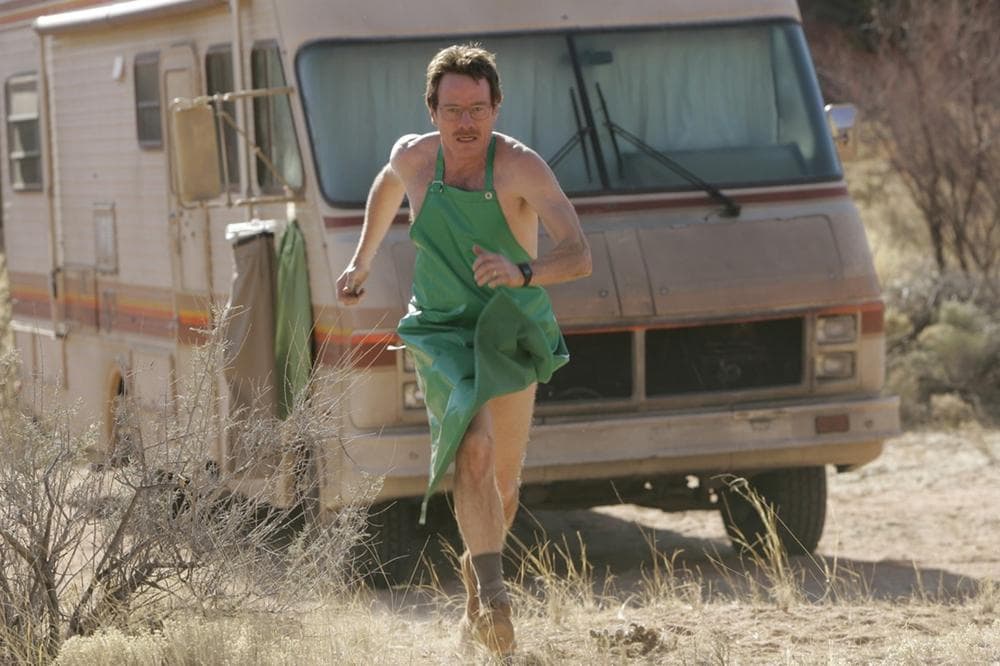 In this photo, Walter White (Bryan Cranston) runs for his life in an early episode of the AMC drama series &quot;Breaking Bad.&quot; (Doug Hyun/AMC/AP)