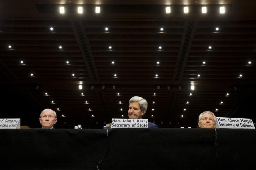 From left, Joint Chiefs Chairman General Martin E. Dempsey, Secretary of State John Kerry, and Defense Secretary Chuck Hagel, testify on Capitol Hill in Washington, Tuesday, Sept. 3, 2013, before the Senate Foreign Relations Committee hearing on Syria. (AP)