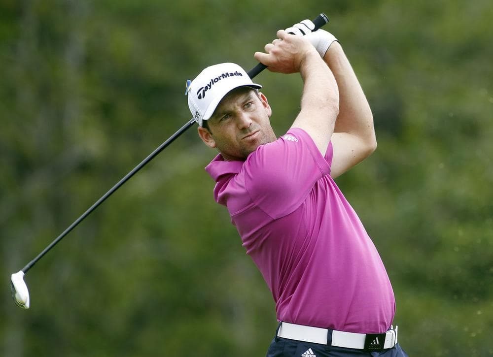 Sergio Garcia, from Spain, tees off on the 17th hole during the second round of the Deutsche Bank Championship golf tournament in Norton, Mass., Saturday, Aug. 31, 2013. (AP Photo/Stew Milne)
