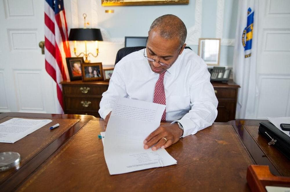 Governor Deval Patrick signs a repeal of the tech tax Friday Sept. 27, 2013. (@MassGovernor)