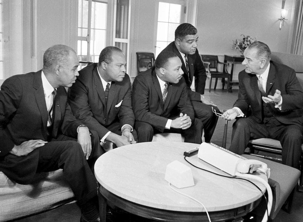 Lyndon Johnson discussing civil rights in 1964 with Roy Wilkins, James Farmer, Martin Luther King Jr. and Whitney Young. (AP)
