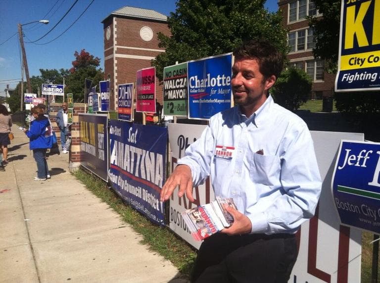 Brian Gannon campaigns for City Council District 1 outside East Boston High School. (WBUR/Fred Thys)