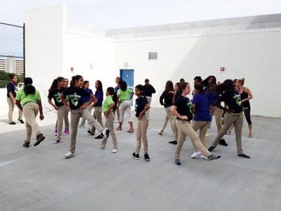 Students at SLAM participate in a rigorous dance class in the school's courtyard. (Phil Latzman/Only A Game)