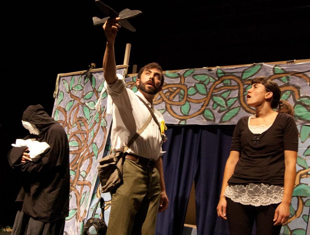 A soldier's bomber plane threatens a Vietnamese mother in Bread and Puppet Theater's revival of its 1965 anti-war show &quot;A Man Says Goodbye to His Mother&quot; at Boston College. (Greg Cook)