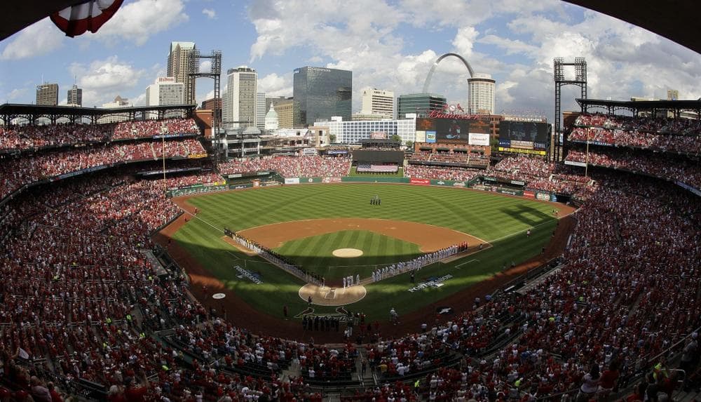The St. Louis Cardinals and the Pittsburgh Pirates are introduced before the start of Game 1 of baseball's National League division series on Thursday, Oct. 3, 2013, in St. Louis. (Mark Humphrey/AP)