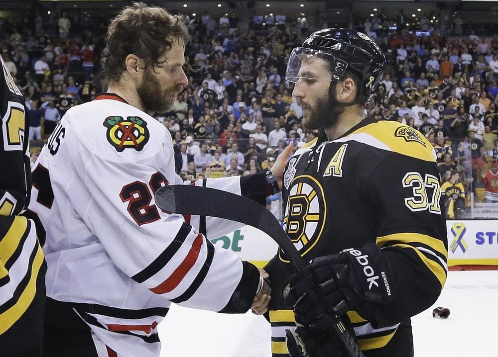 Handshakes, like this one after the Stanley Cup, are banned in Kentucky High School Sports. (Elise Amendola/AP)