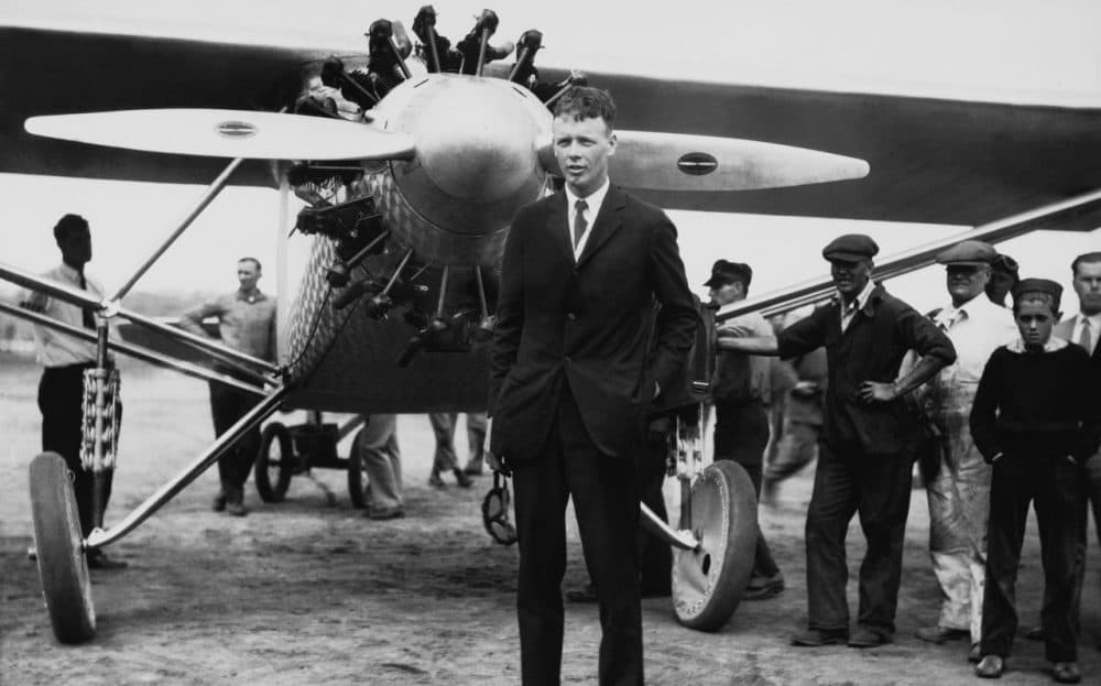 Aviator Charles A. Lindbergh stands in front of his plane &quot;The Spirit of St. Louis&quot; in New York in before his historic solo flight to Paris, May 20, 1927. (AP)