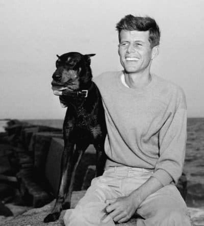 John F. Kennedy, winner of the Democratic Nomination for Congress in the 11th Massachusetts District, relaxes with his dog, Mo, June 22, 1946, Hyannisport, Mass. (Peter J. Carroll/AP)