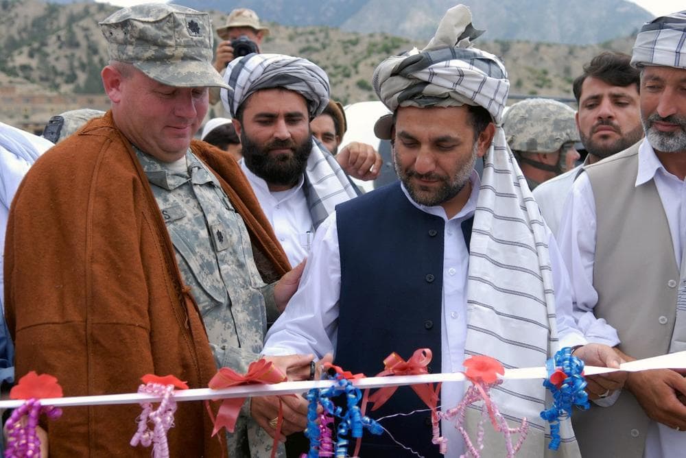 Arsala Jamal in a ribbon cutting ceremony in 2007. He was killed in a mosque bomb on Oct. 15, 2013. (U.S. Navy via Wikimedia) 