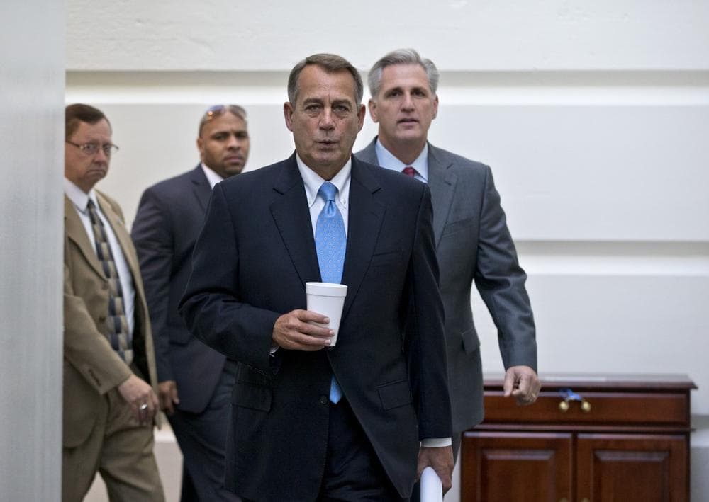 Speaker of the House John Boehner, R-Ohio, with House Majority Whip Kevin McCarthy, R-Calif., right, walks to a meeting of House Republicans at the Capitol in Washington, earlier this week. (AP/J. Scott Applewhite)