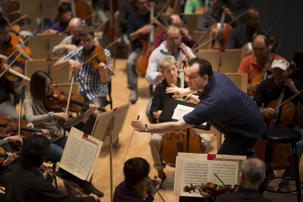 Andris Nelsons leads the BSO in his first rehearsal since being named music director in May. (Marco Borggreve/BSO)