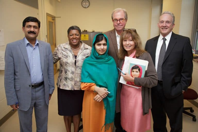 From left: Ziauddin Yousafzai, Jackie Jenkins- Scott, President of Wheelock College, Malala Yousafzai, Nicholas Negroponte, founder of “One Laptop per Child” Association,  Robin Young, host of Here &amp; Now, and Tom McNaught, executive director of the John F. Kennedy Library Foundation. (Tom Fitzsimmons)  