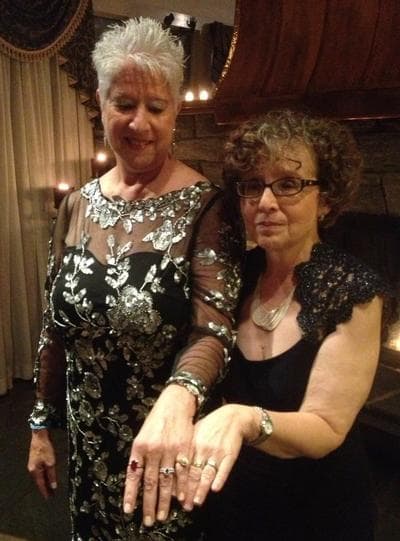 Marsha Shapiro, left, and Louise Walpin show off their rings after becoming one of the first same-sex couples to marry in New Jersey, at 12:01 a.m. on Monday, Oct. 21, 2013. (Courtesy of Louise Walpin)