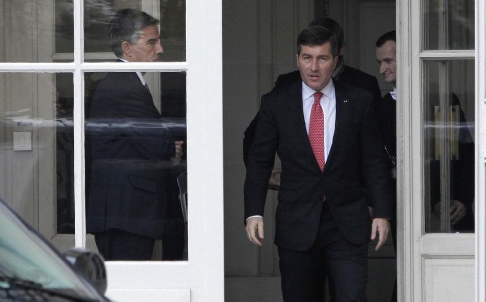 U.S Ambassador to France Charles H. Rivkin, right, leaves the Foreign Ministry in Paris, after he was summoned Monday, Oct. 21, 2013. (Claude Paris/AP)