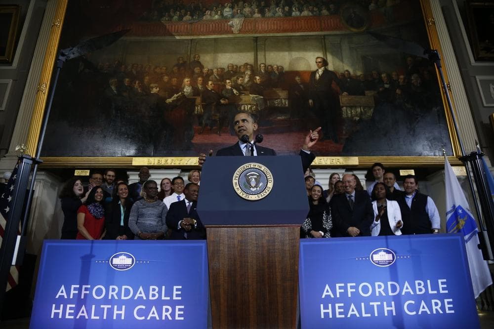 President Obama spoke at Faneuil Hall about the federal health care law. (Charles Dharapak/AP)