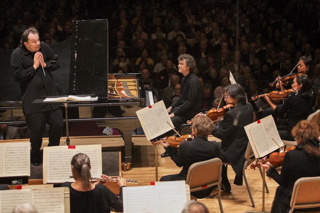 Andris Nelsons and pianist Paul Lewis with the Boston Symphony Orchestra. (Marco Borggreve)