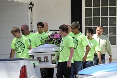 Pallbearers wearing anti-bullying t-shirts carry the casket of Rebecca Sedwick,12, to a waiting hearse as they exit the Whidden-McLean Funeral Home Monday, Sept. 16, 2013, in Bartow, Fla. Polk County Sheriff's Office investigators say they believe Sedwick leaped to her death from a structure at an abandoned cement plant last week following months of bullying. (AP)