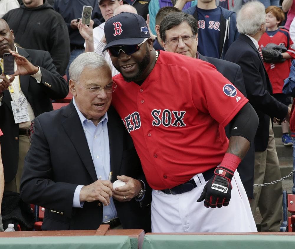Mayor Tom Menino prepares to throw out the ceremonial first pitch at Fenway beside Red Sox designated hitter David Ortiz Friday, Oct. 4, 2013. (AP/Charles Krupa)