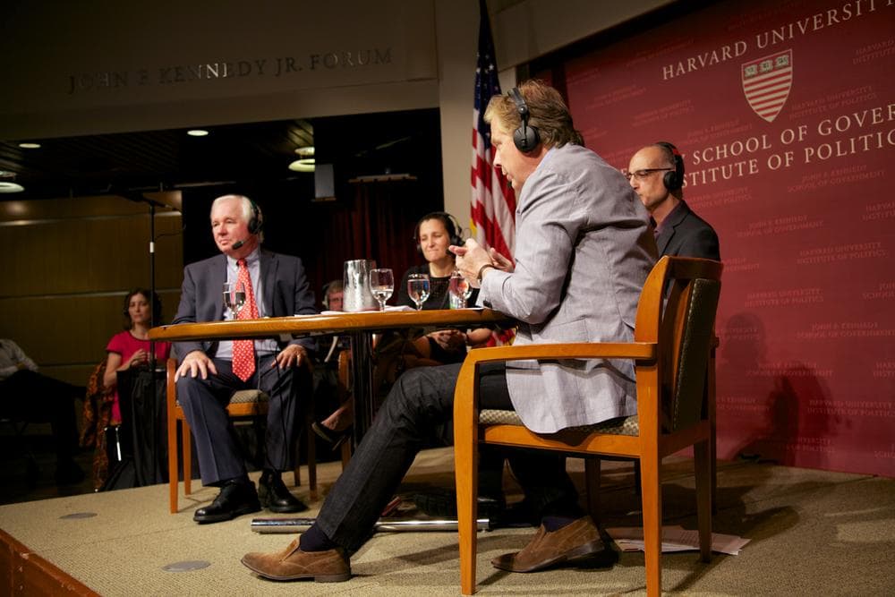 On Point host Tom Ashbrook leads the discussion at the Harvard Kennedy School's kickoff event for its Challenges to Democracy series on Thursday, October 3, 2013. Harvard's Alex Keyssar, Canadian journalist and Liberal Party candidate Chrystia Freeland and Princeton University's Martin Gilens joined Tom on stage. (WBUR)