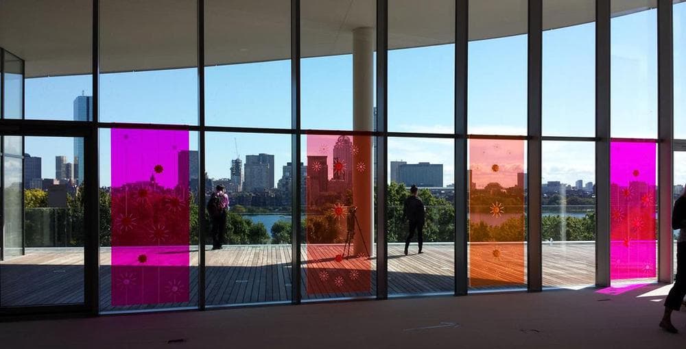 &quot;Little Sun&quot;'s installation in the windows of the MIT Media Lab mezzanine. (Franklin Einspruch)