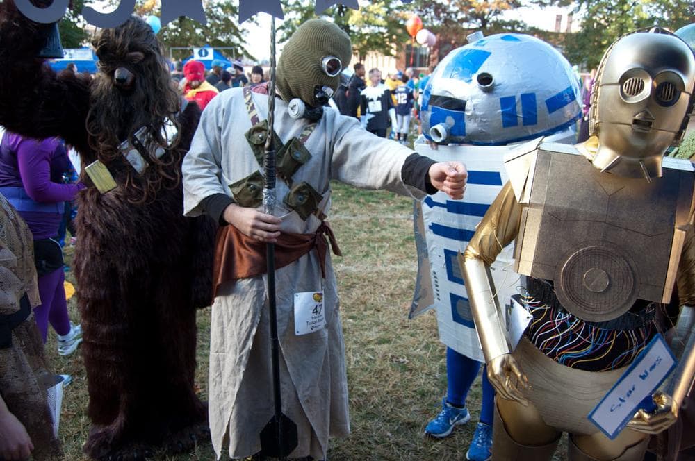 A Star Wars gang registers for the costume competition. (Greg Cook)