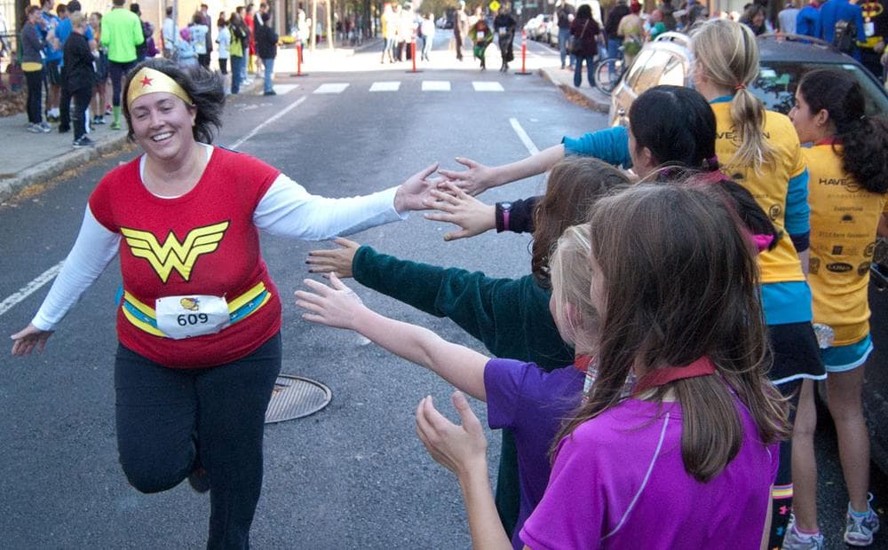Wonder Woman nears the finish line. (Greg Cook)