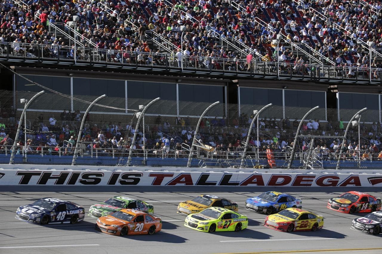 Jimmie Johnson (48) leads the way during a race in the NASCAR Sprint Cup Series. (Jay Sailors/AP)