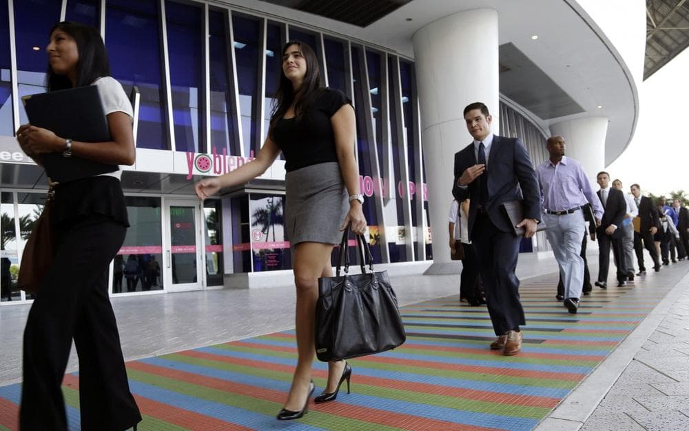 Job applicants arrive for an internship job fair held by the Miami Marlins, at Marlins Park in Miami, Oct. 23, 2013. (Lynne Sladky/AP)