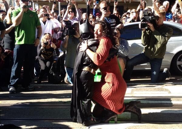 Miles gets a big hug after &quot;rescuing&quot; a damsel in distress. (Mike Pelton/Twitter)