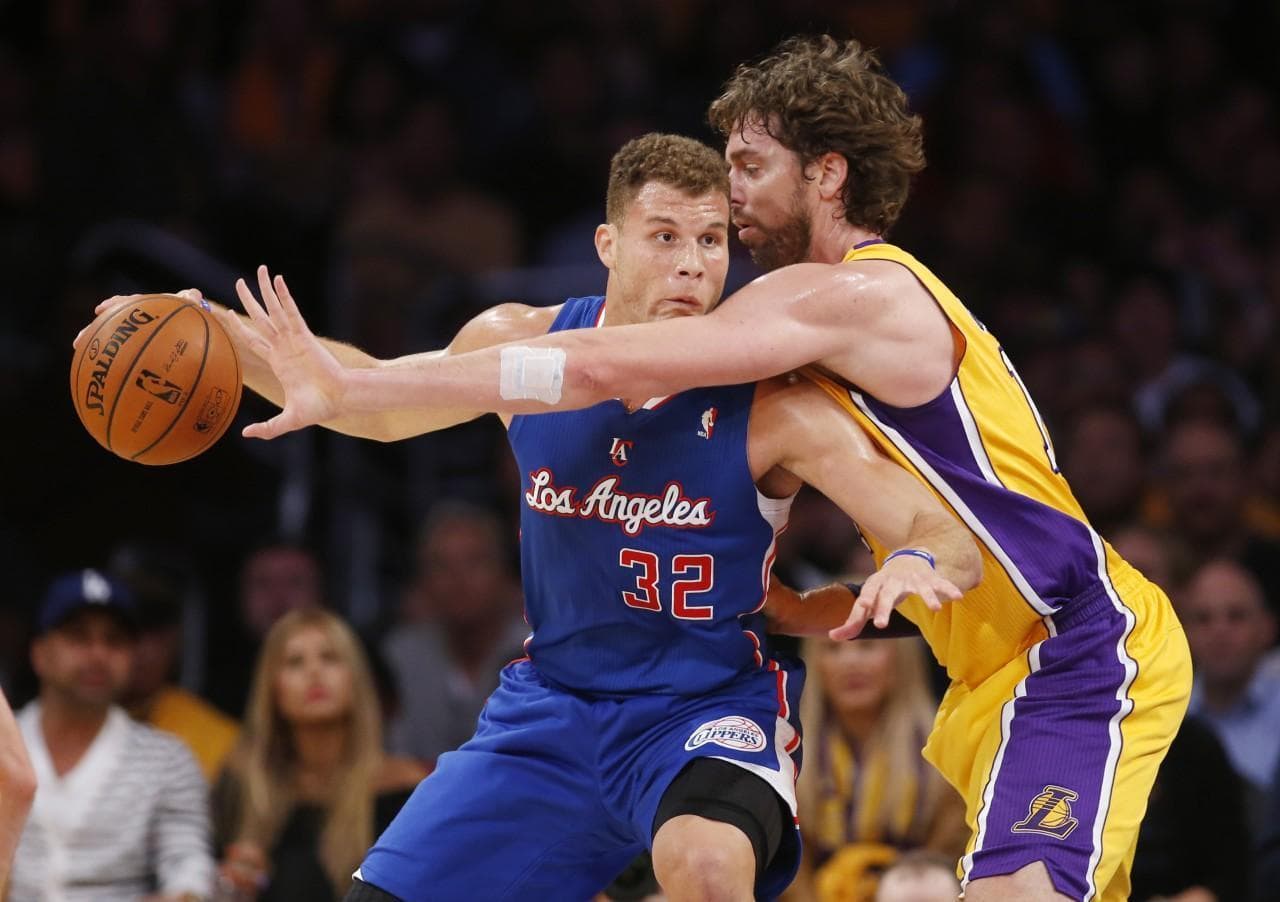 The Clippers and the Lakers go head-to-head on the floor and in the ticket office. (Danny Moloshok/AP)