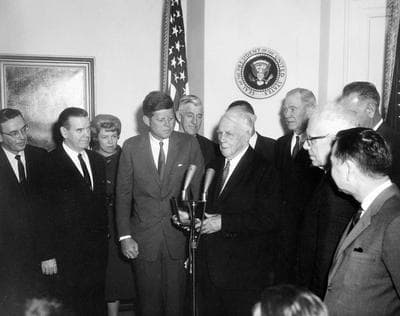 President John F. Kennedy presents a Congressional Gold Medal to poet Robert Frost in the Fish Room of the White House in Washington, D.C. on March 26, 1962. (Courtesy JFK Library)