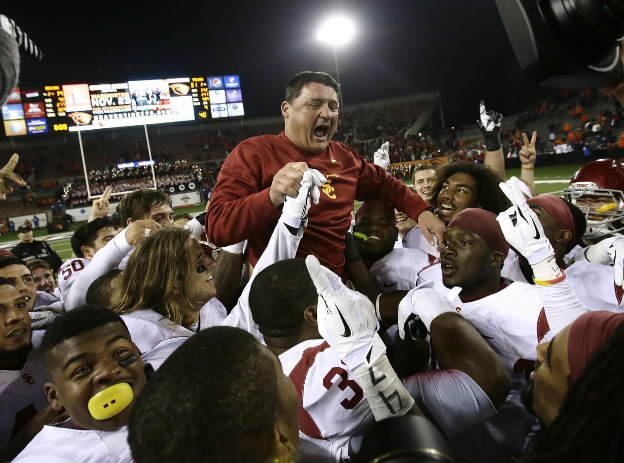 Ed Orgeron celebrates USC's first win at Oregon State since 2004. (Don Ryan/AP)