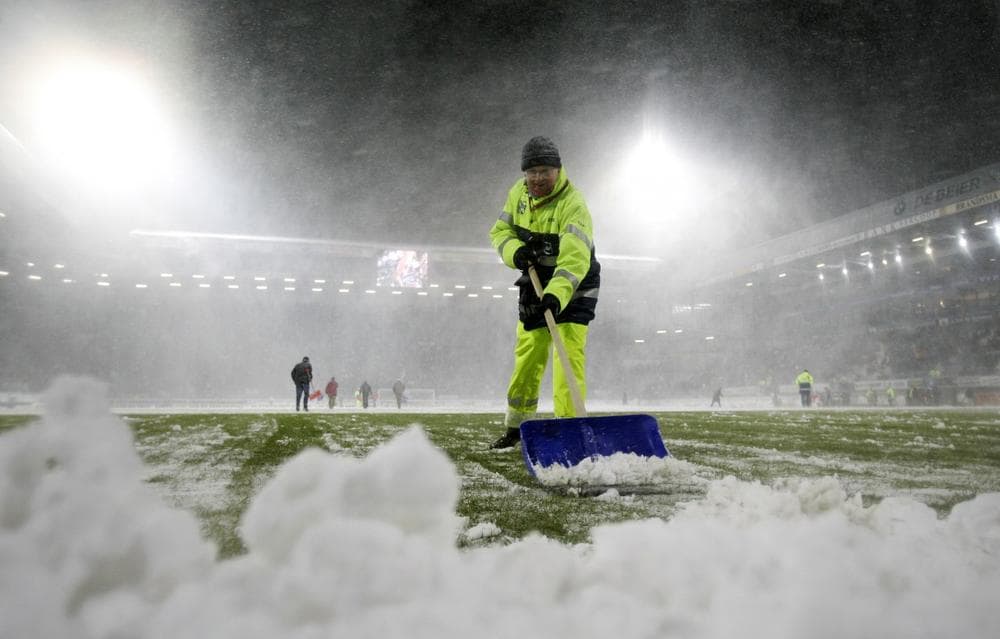 It's that time of year when playing fields become ice rinks. (Bas Czerwinski/AP)