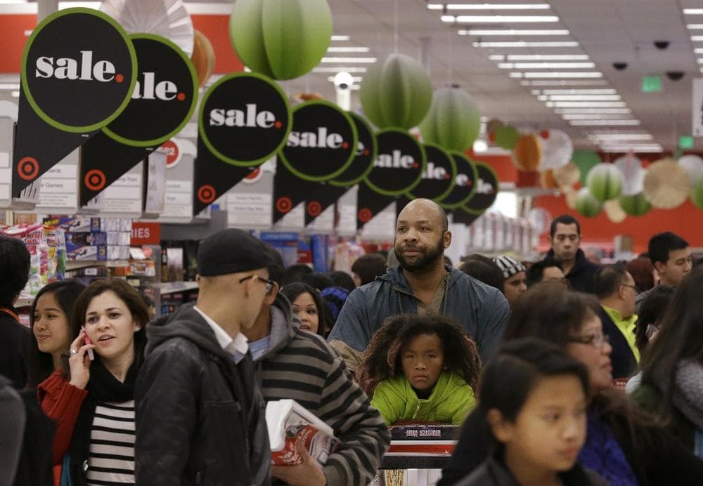 People shop at a Target store in Colma, Calif., Thursday, Nov. 28, 2013. (Jeff Chiu/AP)
