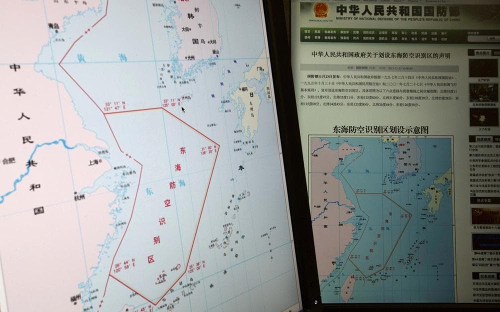 Computer screens display a map showing the outline of China's new air defense zone in the East China Sea on the website of the Chinese Ministry of Defense, in Beijing Tuesday, Nov. 26, 2013. (Ng Han Guan/AP)