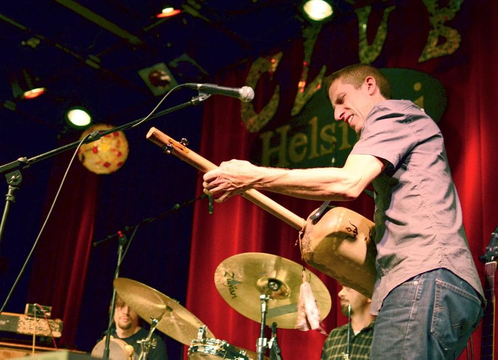 Club d'Elf frontman, bassist Mike Rivard plays the Moroccan sintir at Club Helsinki in 2011. (Andrew Janjigian/Flickr Creative Commons)
