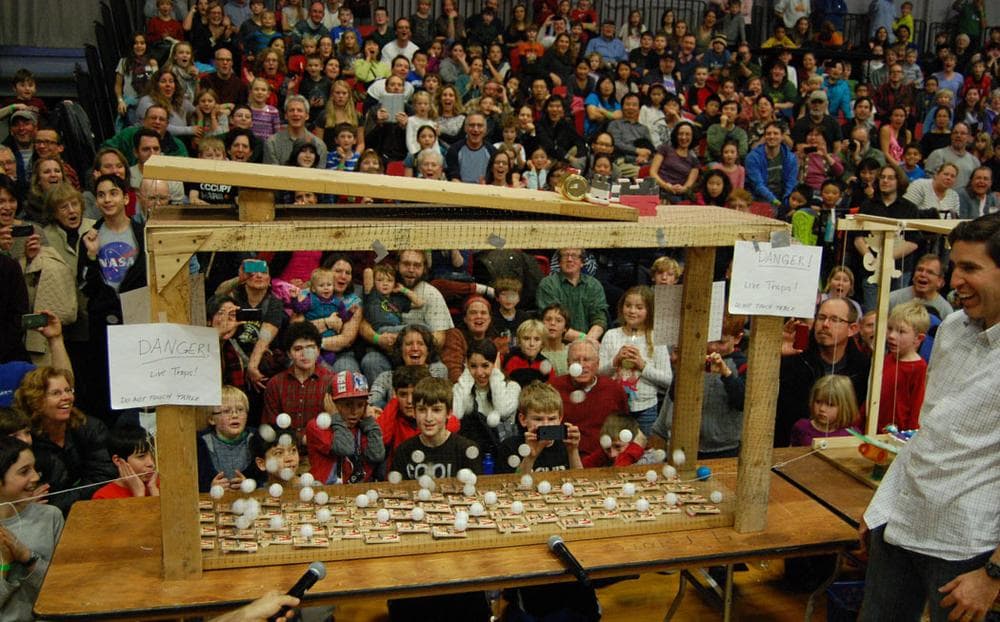 Dozens of mousetraps catapult ping-pong balls during the Friday After Thanksgiving Chain Reaction at Massachusetts Institute of Technology. (Greg Cook)