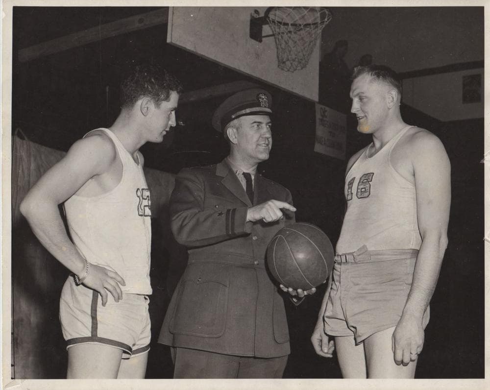 During World War II, Taylor, shown here with players Dike Eddleman (l) and Ed Sakdowski (r) coached an Army Air Force team based at Wright Field in Dayton, Ohio. (Courtesy of Diana Eddleman Lenzi)