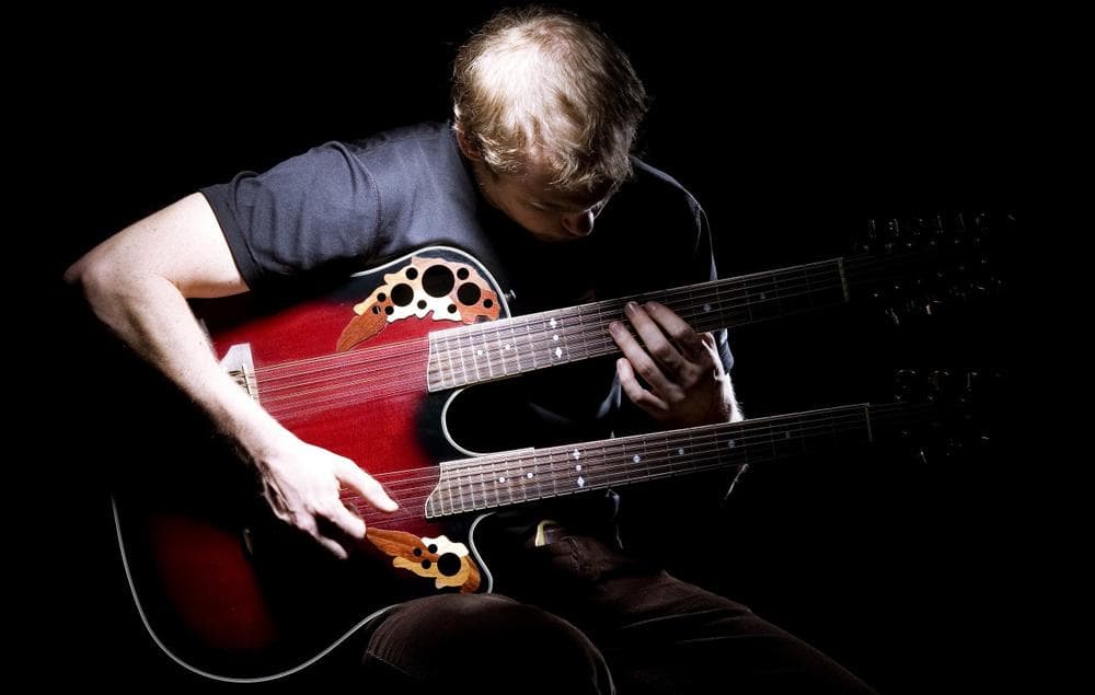 Acoustic double-neck guitarist Ian Ethan Case (Sid Ceaser)