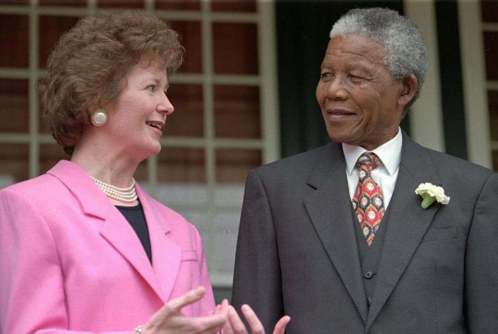 Irish President Mary Robinson, left, talks with South African President Nelson Mandela, right, after addressing the national assembly and senators in Cape Town Tuesday March 26 1996. (Guy Tillim/AP)