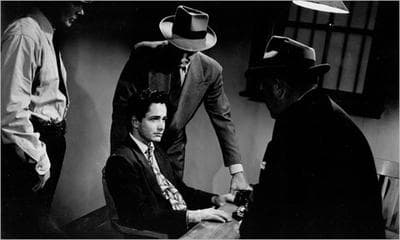 An interrogation scene from the 1949 film noir, “Knock on Any Door.” (marsmet533/Flickr)