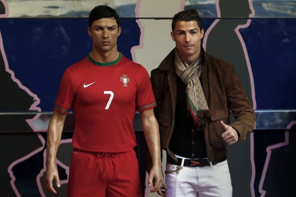 Ronaldo or wax Rondaldo? It's hard to tell determine which is the real deal. (Andres Kudacki/AP)