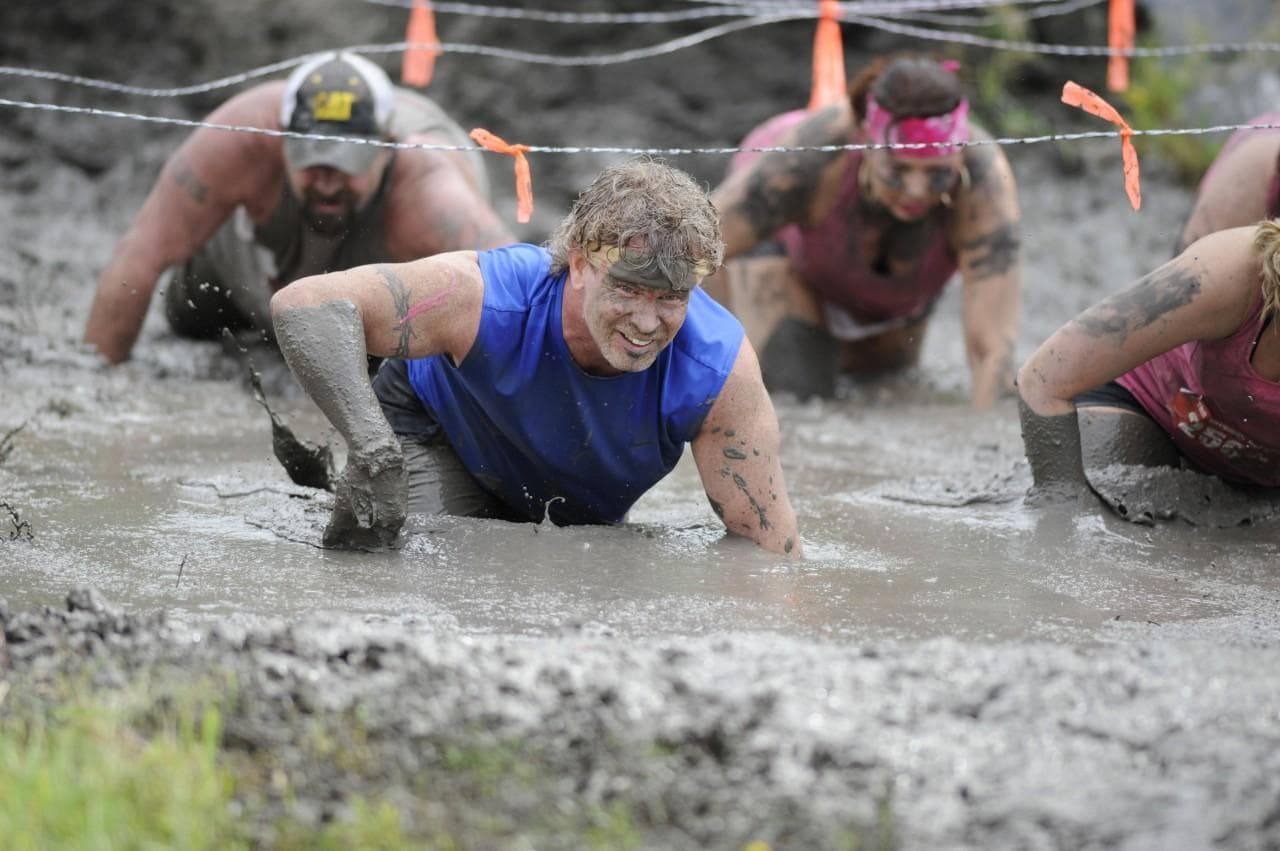 The sport of adventure racing is rapidly growing. Here participants move through the Mud Monster in The Survival Race in Dallas. (J. Dennis Thomas/Nuvision Action Image LLC/AP)