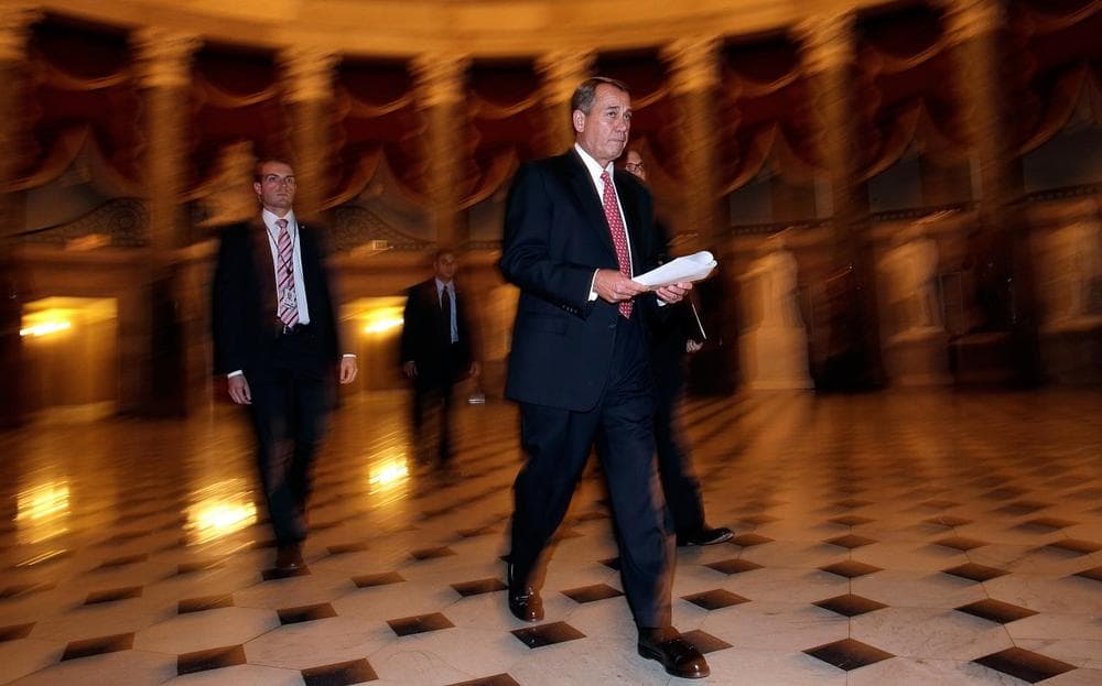 U.S. Speaker of the House John Boehner (R-OH) walks to the House Chamber to vote on the recently announced bipartisan budget agreement December 12, 2013 in Washington, DC. (Win McNamee/Getty Images)