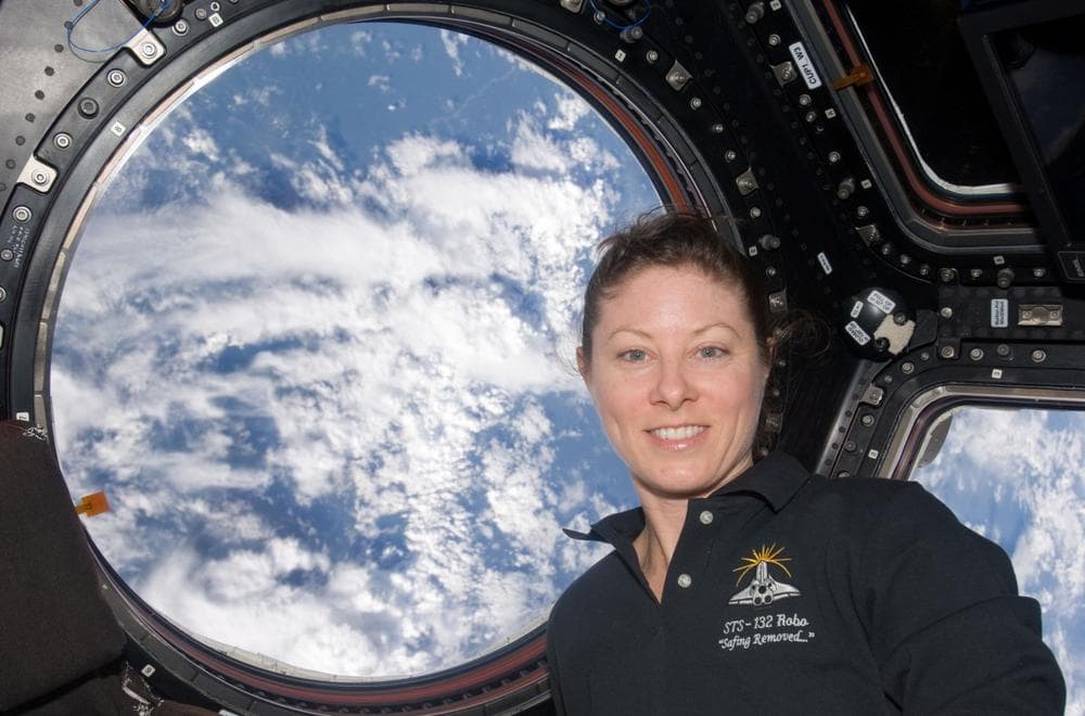 NASA astronaut Tracy Caldwell Dyson is pictured inside the International Space Station's Cupola in 2010. (NASA)