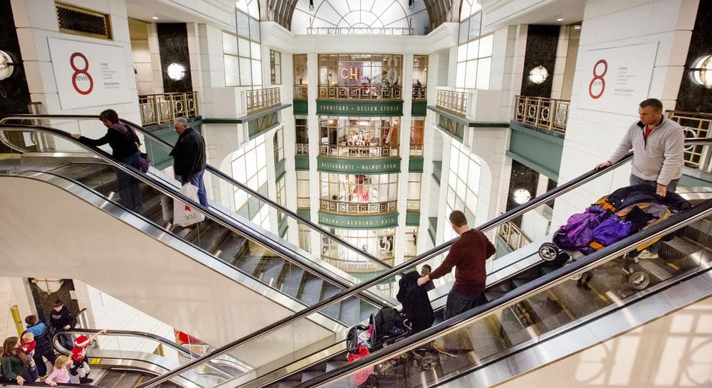 Shoppers ride escalators between floors during Black Friday shopping at Macy's on Black Friday, Nov. 29, 2013, in Chicago.(Andrew A. Nelles/AP)