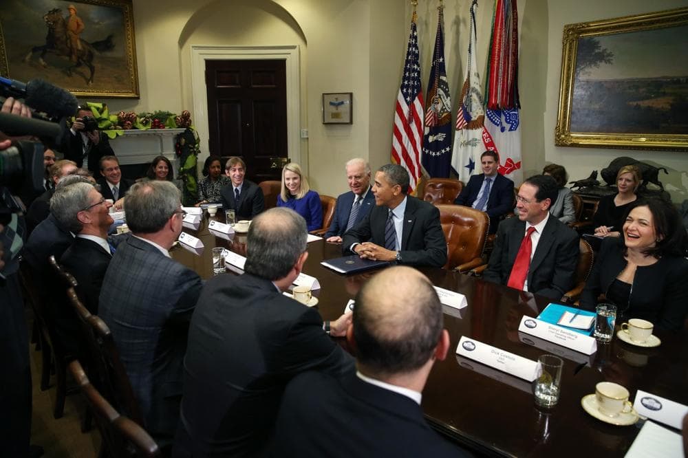 U.S. President Barack Obama and Vice President Joe Biden meet with executives from leading technology companies, including Apple, Twitter and Google, in the Roosevelt Room of the White House on December 17, 2013. (Mark Wilson/Getty Images)