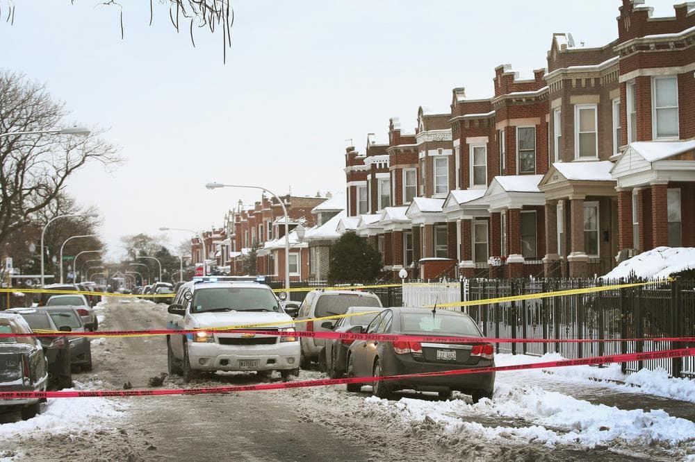 Police investigate a homicide scene in the Lawndale neighborhood on December 15, 2013, in Chicago, Illinois. (Scott Olson/Getty Images )