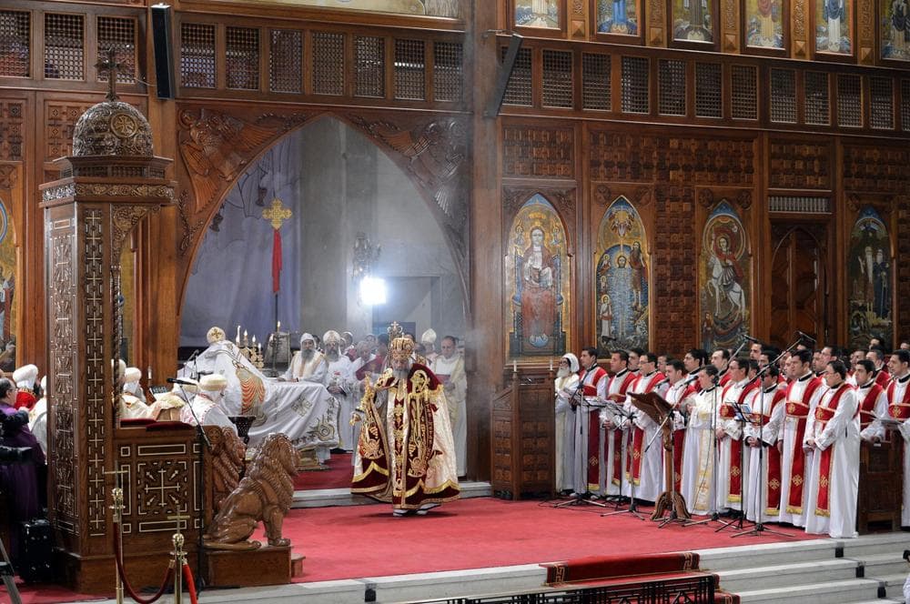  The leader of Egypt's Coptic Christians, Pope Tawadros II (c), leads the Coptic Christmas midnight mass at the al-Abasseya Cathedral in Cairo late on January 6, 2013. (Khaled Desouki/AFP/Getty Images)