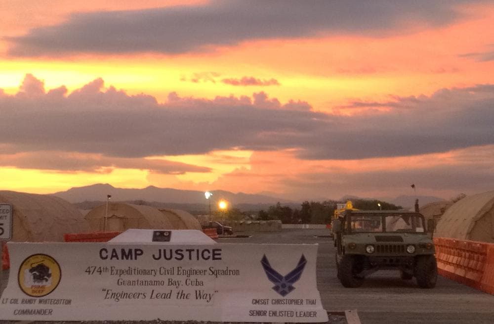 The entrance to Camp Justice at the Guantanamo Bay Naval Base is seen on October 24, 2013, in Guantanamo Bay, Cuba. The tents at Camp Justice house media, lawyers, human rights observers, and military personnel. (Chantal Valery/AFP/Getty Images)